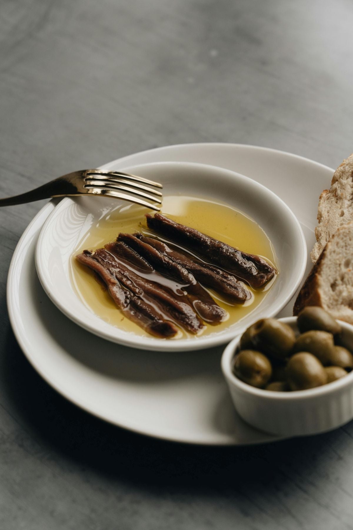 Translation missing: en.Tinned fish, roasted peppers and toast served on plate: Tinned Fish, Pickles & Co