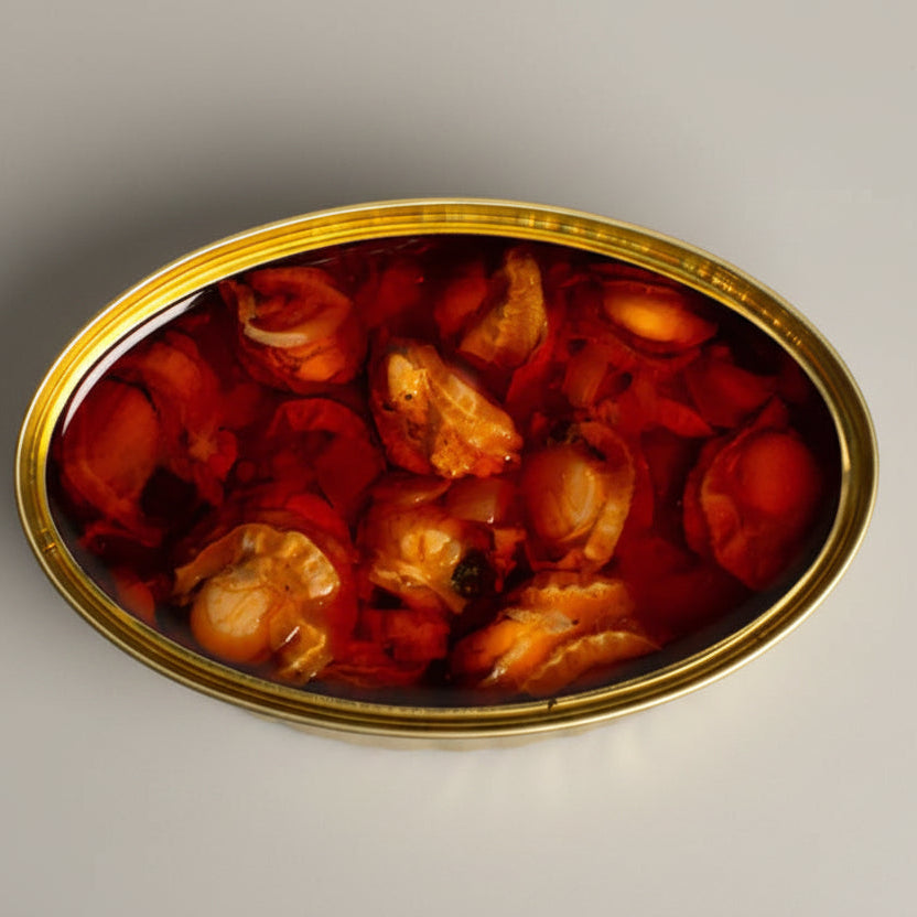 Can of scallops on a wooden surface